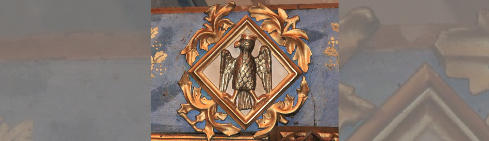 L'église Saint Jacques :détail du retable de la confrérie des Tisserands, Blason à l'aigle couronné, 